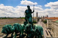 Lion-quadriga on top of the Siegestor in Munich photographed from above with a drone.